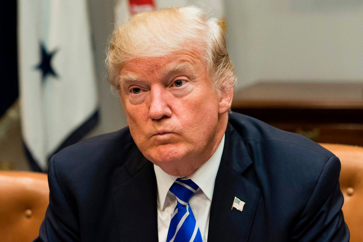 Os EUA estão atingindo aqueles que facilitarem transações financeiras para a Coreia do Norte | SAUL LOEB/AFP