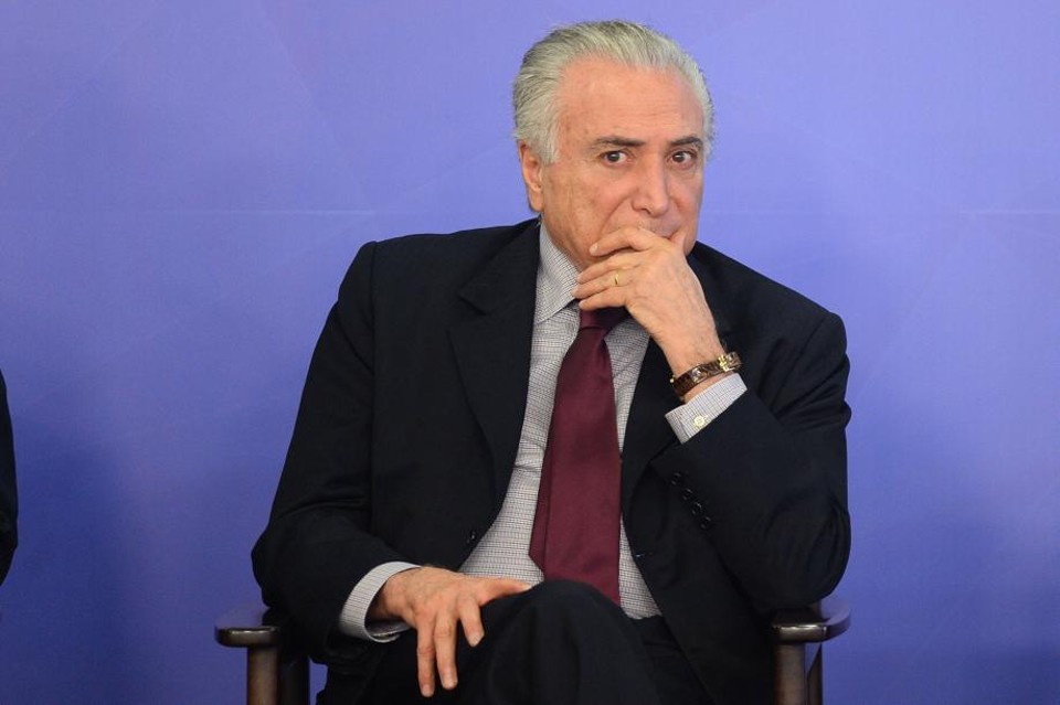 Presidente Michel Temer defende interesses de deputados em momento que precisa de apoio contra denúncia apresentada pela PGR. | Andressa Anholete/AFP