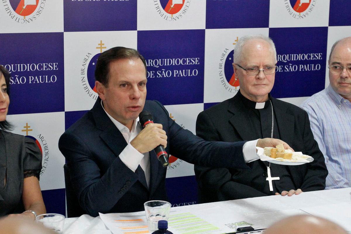 João Doria, prefeito de São Paulo, e o arcebispo de São Paulo, dom Odilo Scherer | HELLOISA BALLARINI/AFP