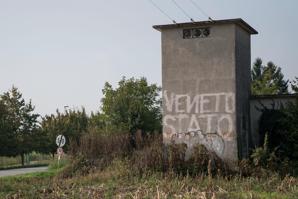 Grafite pró-autonomia de Vêneto escrito ‘Estado de Veneto ', em Asiago, na Itália | Federico Bernini/Bloomberg