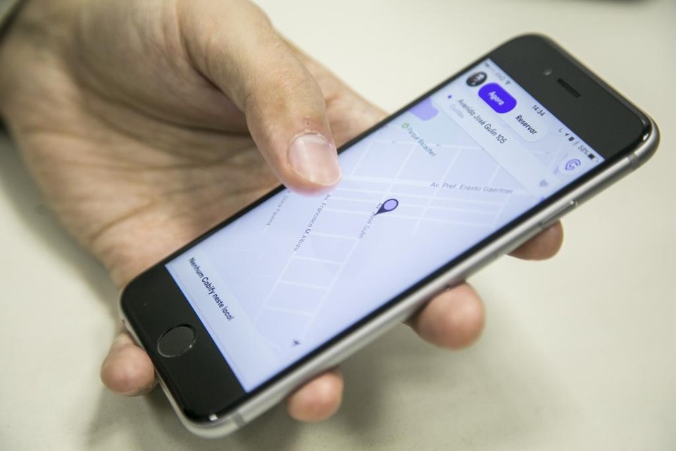 Aplicativo da Cabify em um iPhone. | Marcelo Andrade/Gazeta do Povo