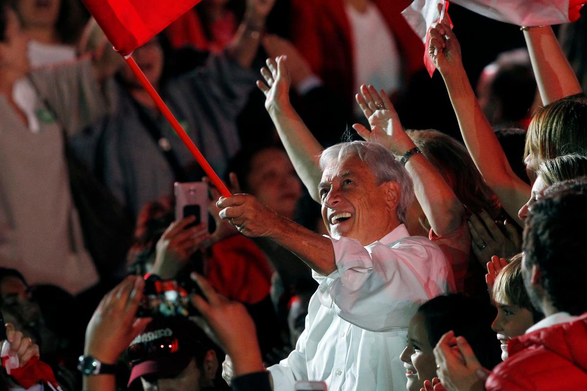 O candidato de centro-direita Sebastián Piñera lidera as pesquisas de opinião | CLAUDIO REYESAFP