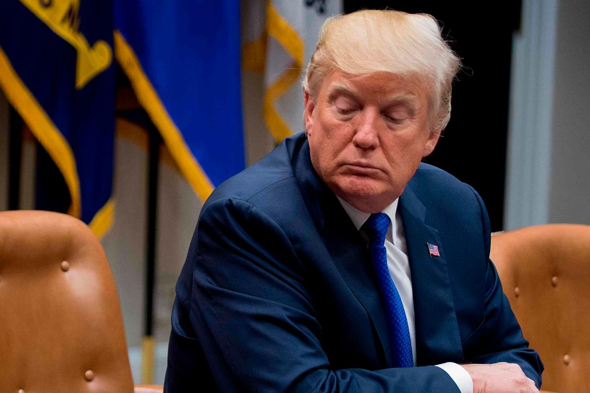 Trump retuitou os vídeos sem fazer nenhum comentário | JIM WATSON/AFP