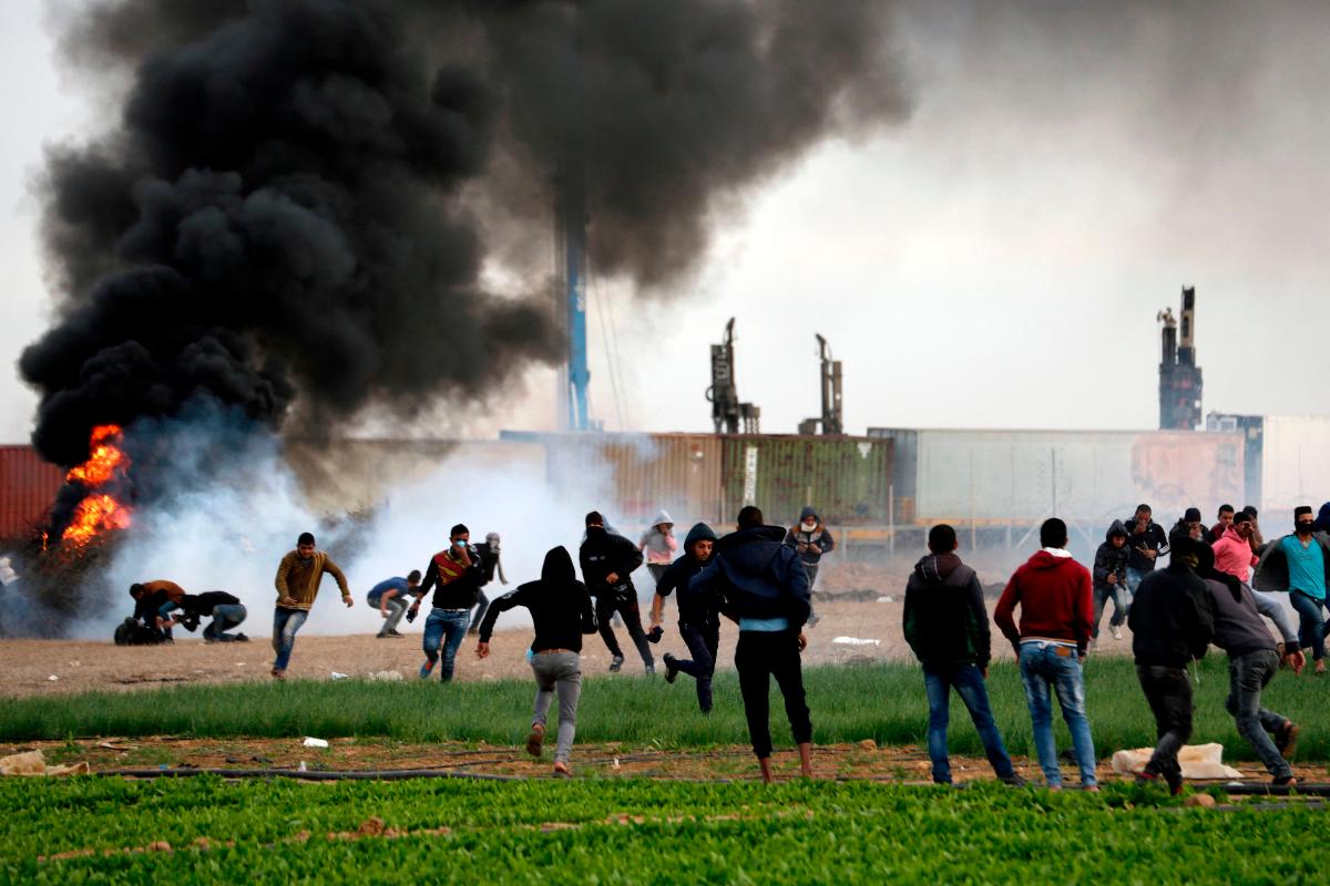 A violência na fronteira da região aumentou na última semana após o anúncio de Trump sobre tornar Jerusalém capital de Israel | MAHMUD HAMS/AFP