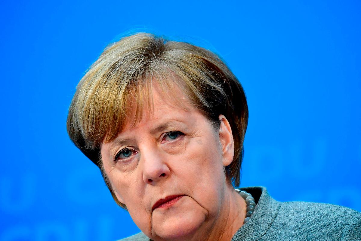 Os conservadores de Merkel e os social-democratas governam a Alemanha juntos desde 2013 em uma grande coalizão | TOBIAS SCHWARZ/AFP