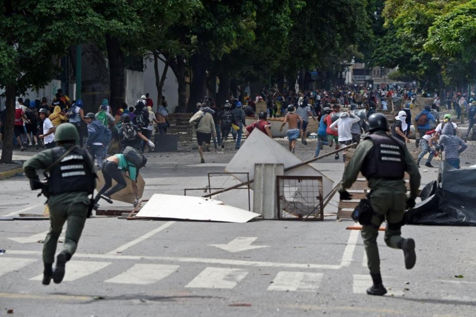 Polícia venezuela ataca manifestantes em Caracas | Juan Barreto /AFP