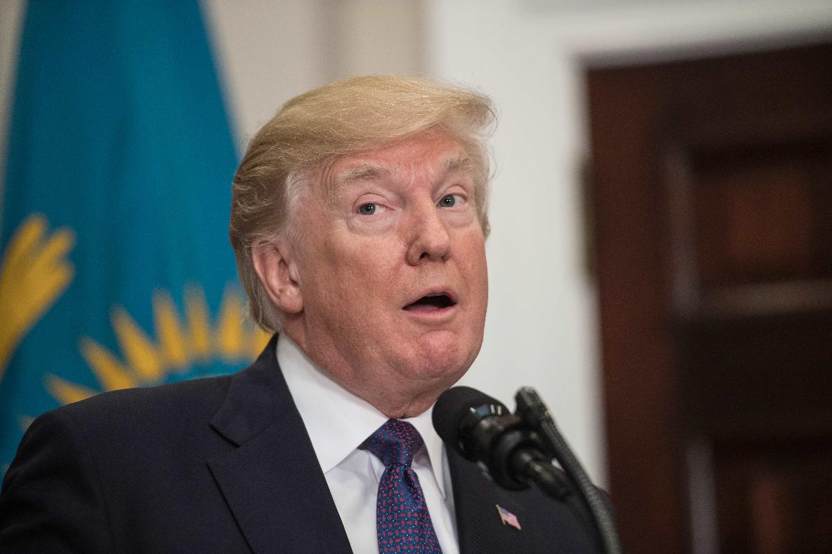 Trump foi amplamente criticado após citar “países de merda” | NICHOLAS KAMM/
AFP