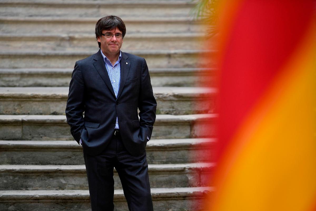 Para que tome posse do cargo de presidente da Catalunha Puigdemont deverá retornar à Espanha. Caso contrário, sua candidatura não será legitimada | PIERRE-PHILIPPE MARCOU/AFP