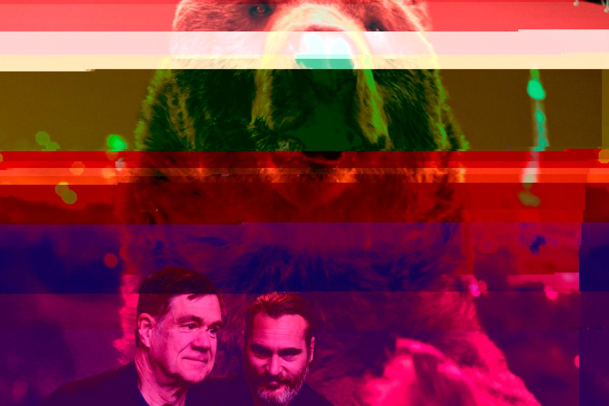 O diretor e roteirista Gus Van Sant (à esq.) e o ator Joaquin Phoenix (à dir), que interpreta o cartunista John Callahan, durante uma coletiva de imprensa | TOBIAS SCHWARZ/AFP