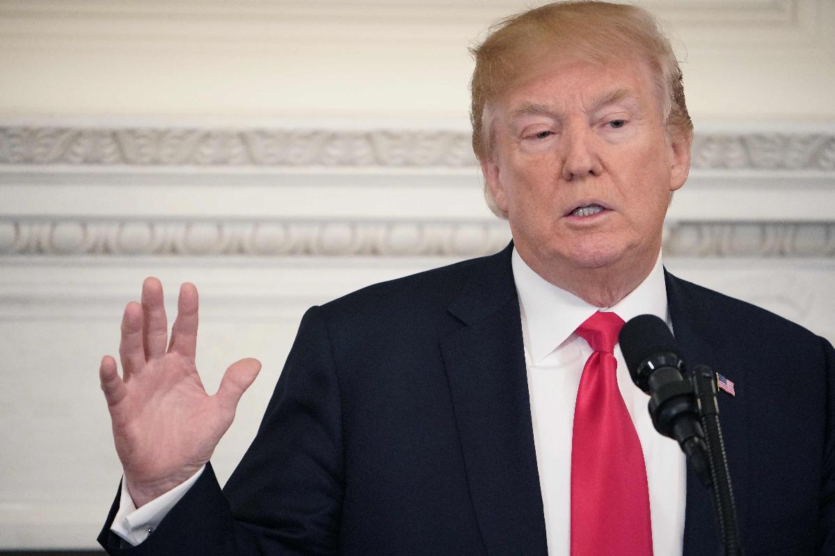 O presidente tem travado uma queda de braço sobre imigração com a Justiça e o Congresso | MANDEL NGAN/
AFP