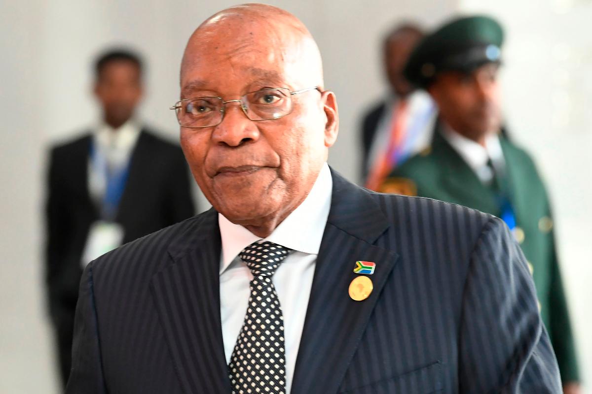 O partido de Zuma e partidos da oposição querem sua renúncia. Ele, no entanto, nega deixar o cargo | SIMON MAINA/AFP