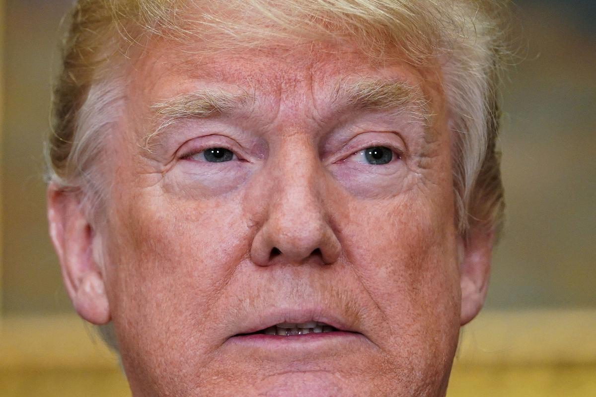 Trump nega que seus assessores de campanha se associaram com o Kremlin ou que ele tenha obstruído a Justiça ao demitir o então diretor do FBI durante as investigações da interferência | MANDEL NGAN/
AFP