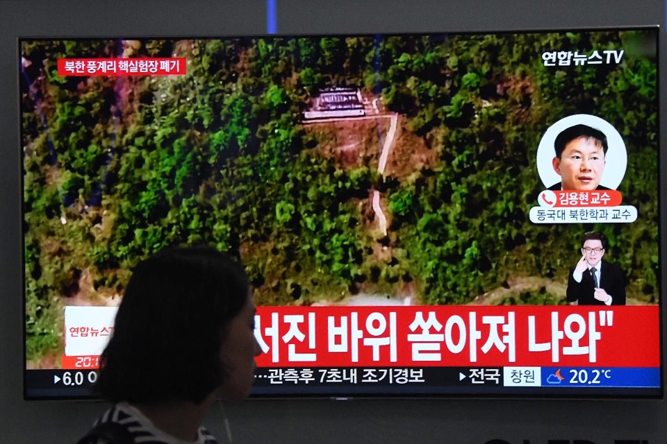Em Seul, noticiário fala sobre o desmantelamento do centro de testes nucleares da Coreia do Norte em Punggye-ri | JUNG YEON-JEAFP