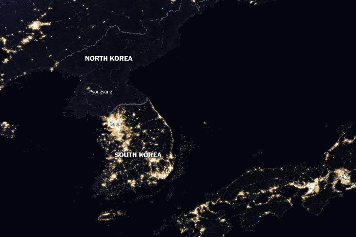 Imagem de satélite mostra a diferença na iluminação noturna na Coreia do Norte e na Coreia do Sul | NASA-The Washington PostNASA-The Washington Post