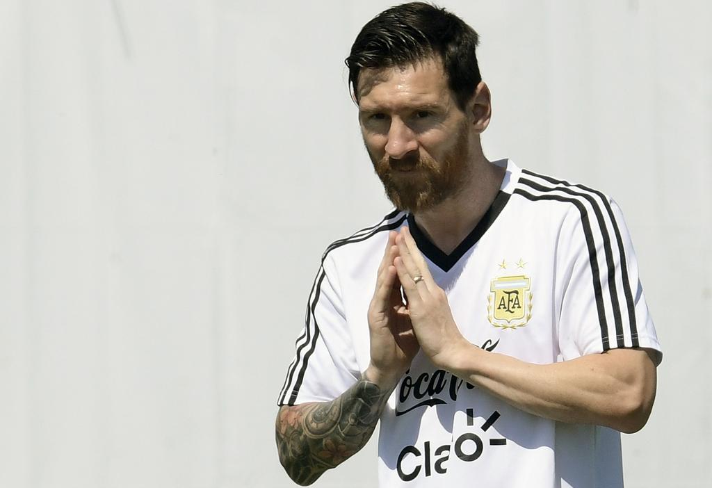 Messi carregou fitinha da sorte contra a Nigéria | JUAN MABROMATA/AFP