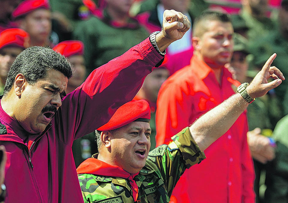 Ditador Nicolás Maduro e o vice-presidente do PSUV, Diosdado Cabello | FEDERICO PARRAAFP