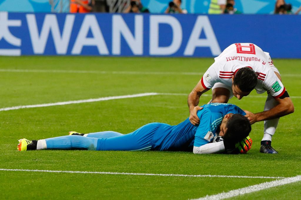 Placa publicitária do Grupo Wanda. | JACK GUEZ/AFP