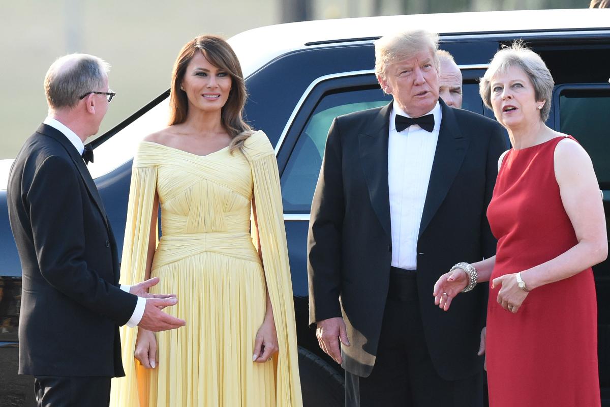 Melania Trump, primeira-dama americana, Donald Trump e Theresa May chegam para jantar com empresários | GEOFF PUGH/AFP