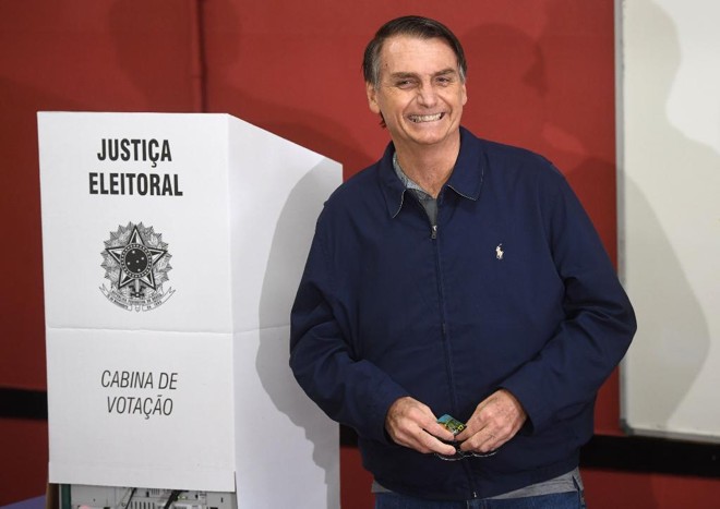 Até meados de abril Jair Bolsonaro terá de deixar claro para o cidadão e para o setor produtivo e financeiro o que pretende fazer em seu governo. | Mauro Pimentel/AFP