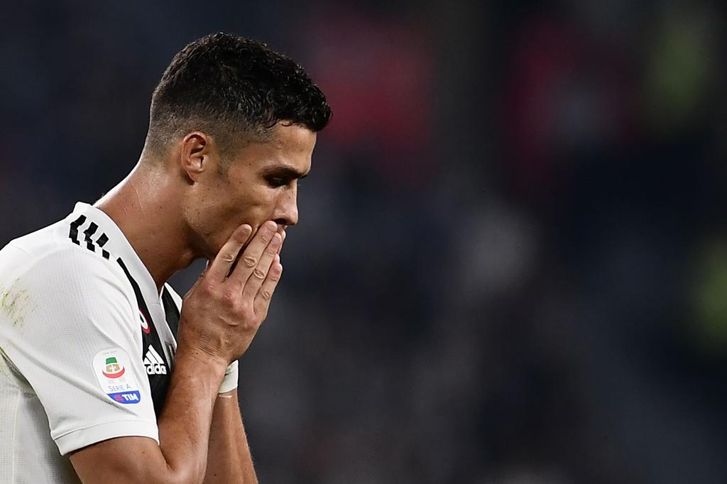 Cristiano Ronaldo em ação pela Juventus. | MARCO BERTORELLO/AFP