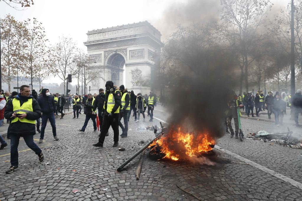 Ao longo da última semana de protestos, duas pessoas morreram e centenas ficaram feridas | Francois Guillo/AFP