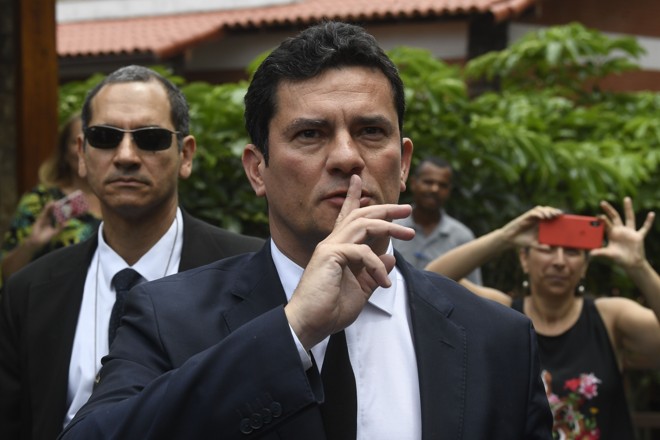Juiz Federal Sergio Moro: antes de aceitar ser ministro da Justiça, rotina incluiu interrogatório de Eduardo Cunha e pedido de ação contra Mantega. | MAURO PIMENTEL/AFP
