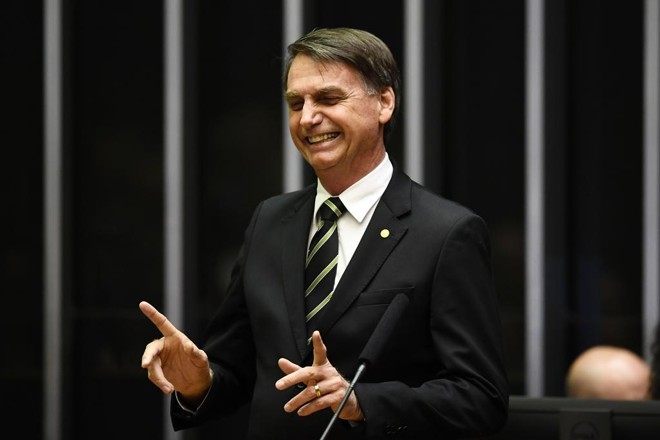 Jair Bolsonaro participou de cerimônia alusiva aos 30 anos da aprovação da Constituição Federal, nesta terça-feira, no plenário do Congresso. | Evaristo Sa/AFP