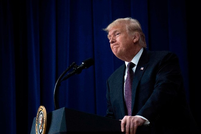 O presidente Donald Trump fala sobre apoio a veteranos e famílias de militares em discurso na Casa Branca, 15 de novembro | JIM WATSON / AFP