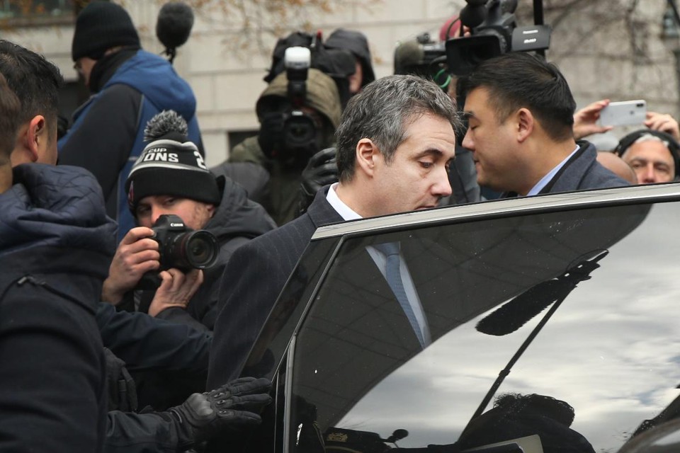 Michael Cohen, ex-advogado e agente pessoal do presidente dos EUA Donald Trump, sai do tribunal federal em Nova York, 12 de dezembro | SPENCER PLATT / AFP