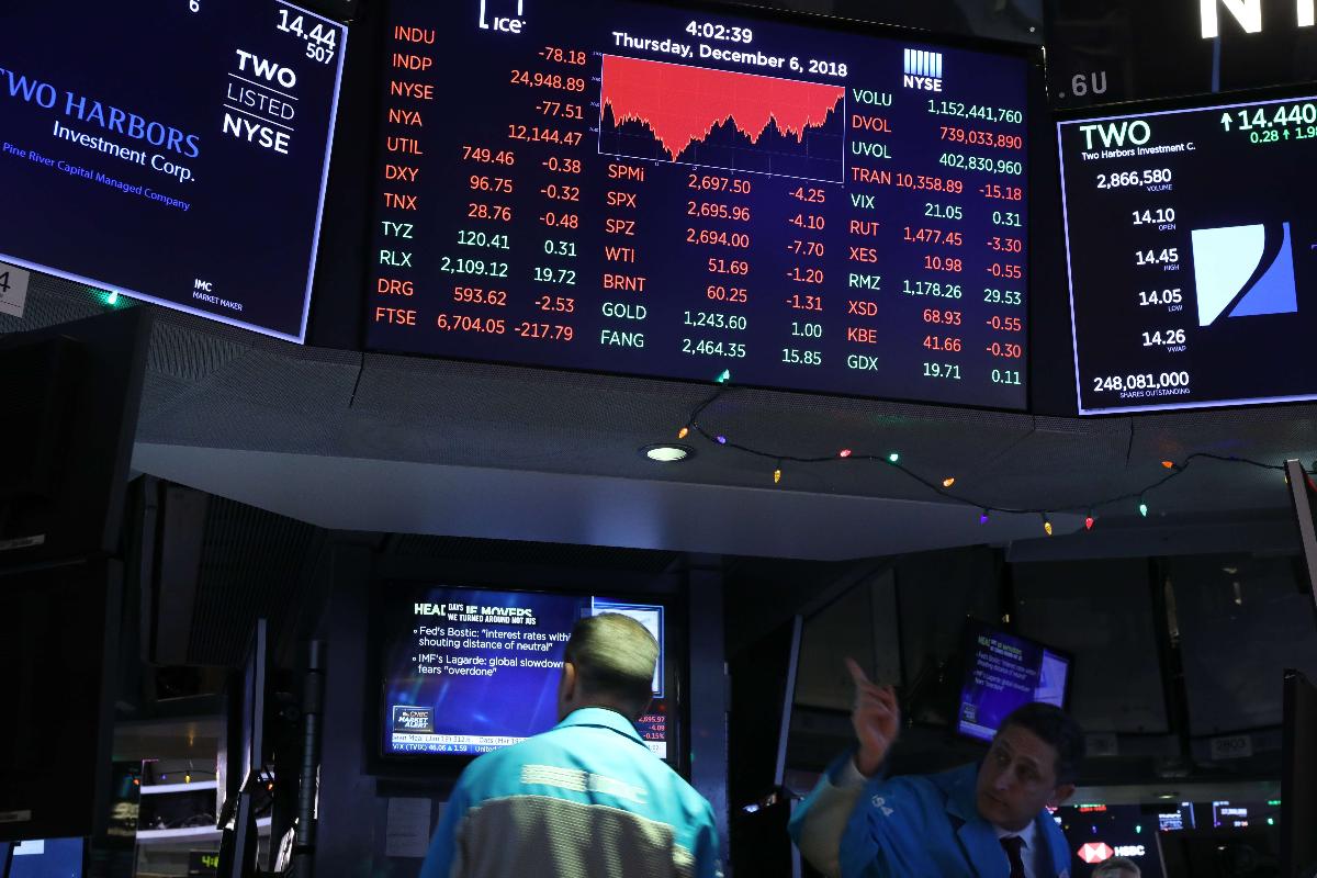 Traders trabalham na Bolsa de Nova York (NYSE) | SPENCER PLATT/AFP