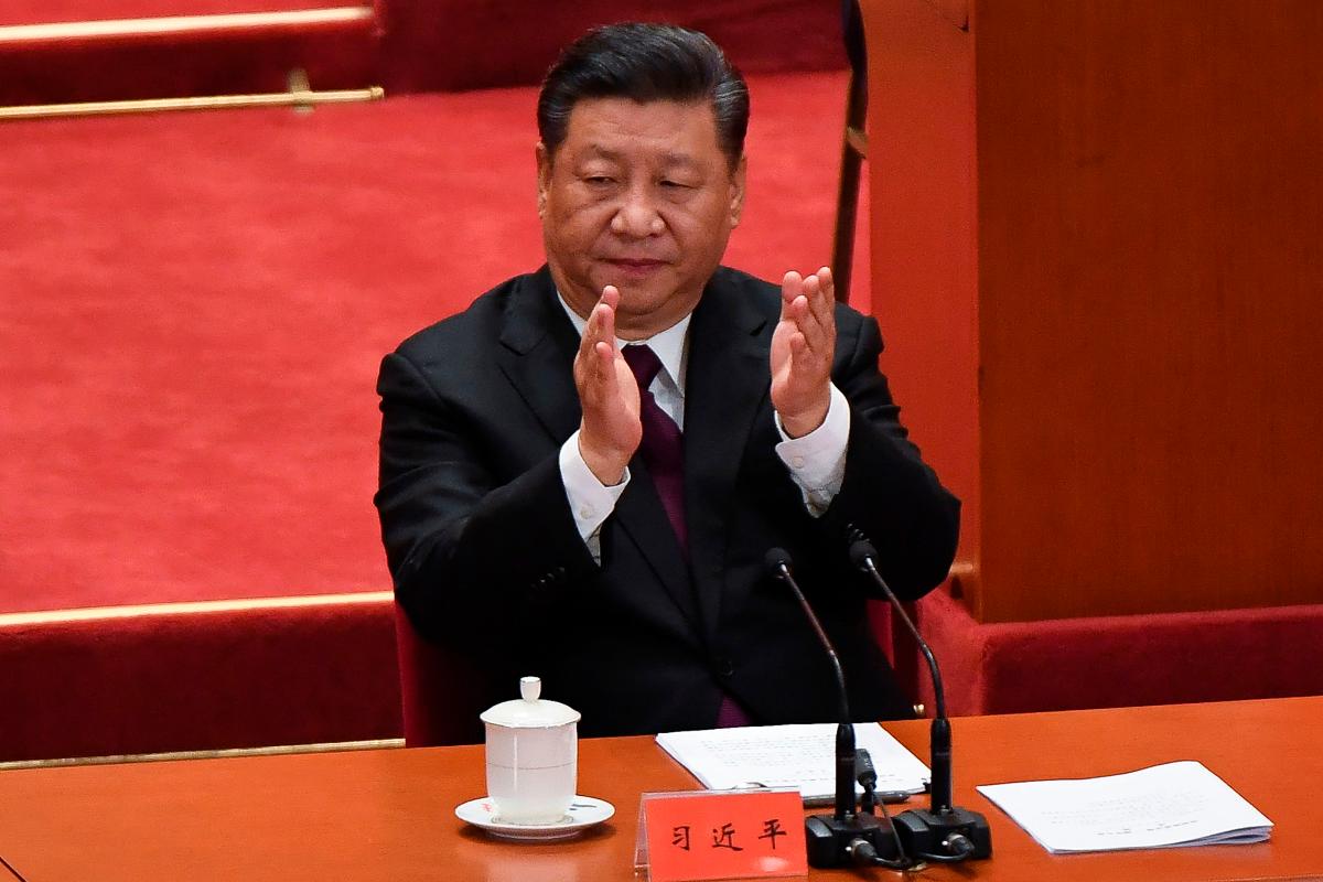 O presidente da china, Xi Jinping, durante celebração dos 40 anos de reformas e abertura do país, no Grande Salão do Povo, em Pequim, 18 de dezembro | WANG ZHAO / AFP