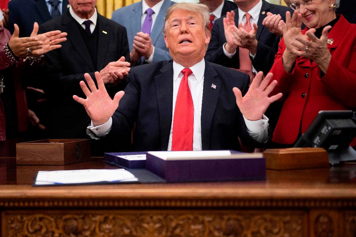 Trump disse anteriormente que ‘se os democratas votassem contra o muro, a paralisação duraria muito tempo’ | JIM WATSON/AFP