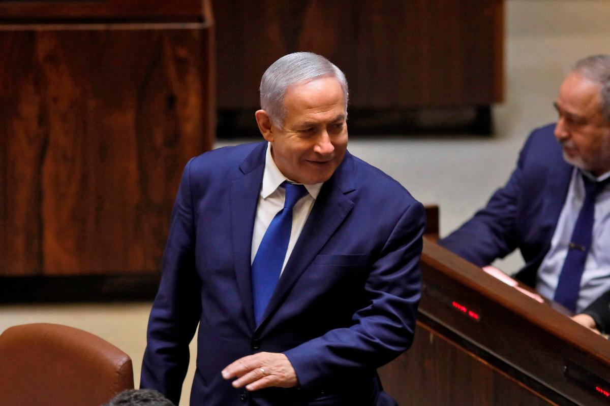 O primeiro-ministro de Israel, Benjamin Netanyahu, durante sessão do Knesset, o Parlamento Israelense, em Jerusalém, 26 de dezembro | MENAHEM KAHANA / AFP
