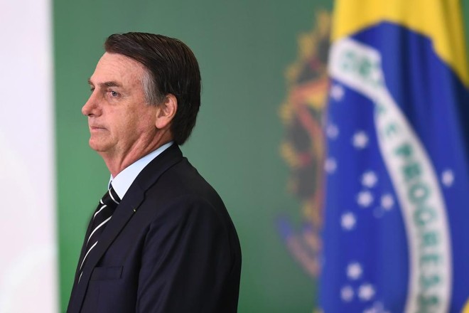Jair Bolsonaro prometeu “libertar a pátria do jugo da corrupção, da criminalidade, da irresponsabilidade econômica e da submissão ideológica” ao tomar posse na Presidência. | Evaristo Sá/AFP
