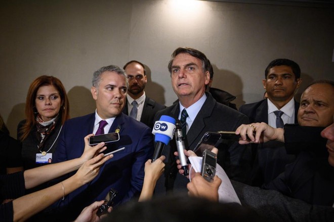 Presidente Jair Bolsonaro em raro momento de conversa com a imprensa durante o Fórum Econômico de Davos. | FABRICE COFFRINI/AFP