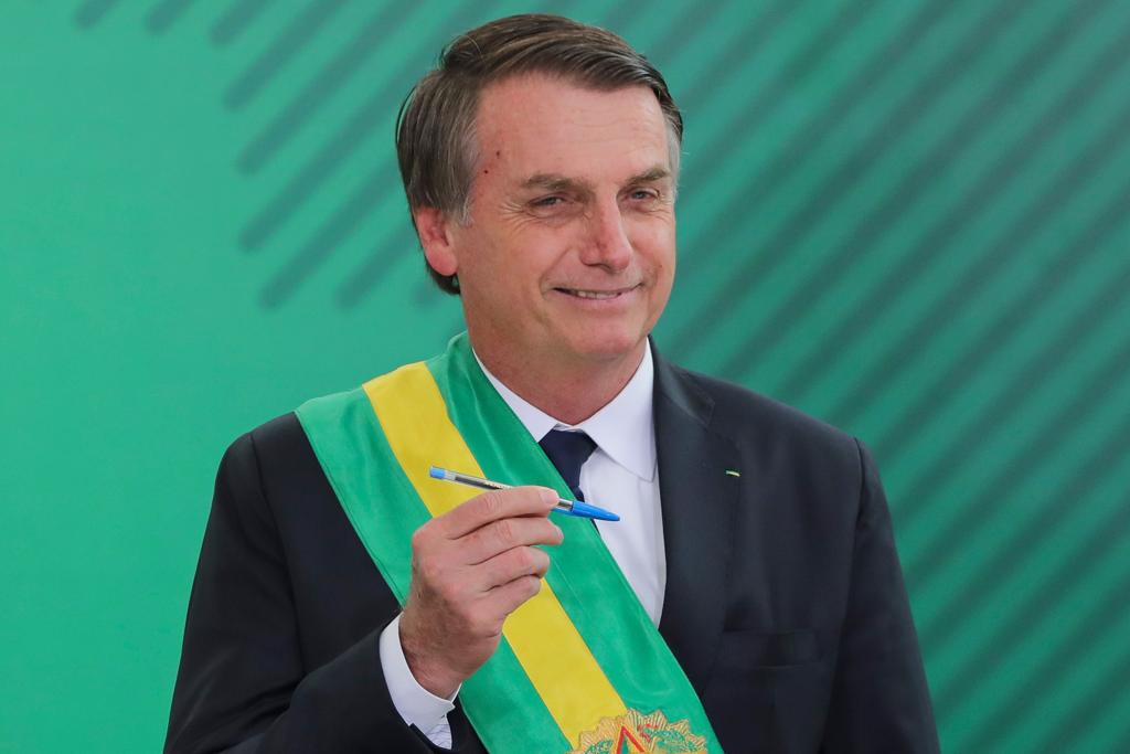 O novo presidente do Brasil, Jair Bolsonaro, no Palácio do Planalto, em Brasília, em 1º de janeiro de 2019, após a cerimônia de posse no Congresso Nacional. | SERGIO LIMA/AFP
