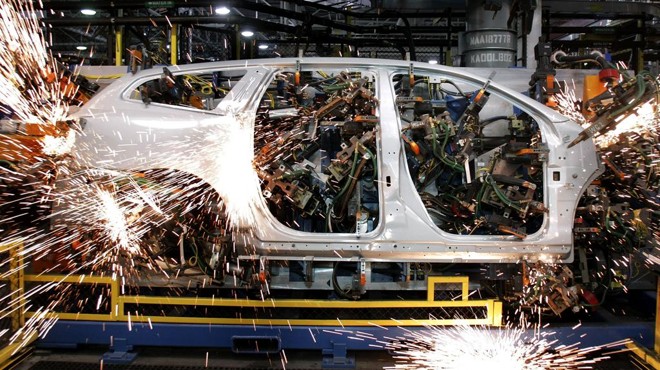 Robôs trabalham em planta 4.0 da GM nos EUA | Bill Pugliano/Getty Images/AFP