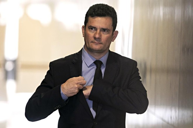 Em viagem a Washington com o presidente Jair Bolsonaro, Sergio Moro firmou acordos de troca de informações com autoridades de segurança dos Estados Unidos. | SERGIO LIMA/AFP