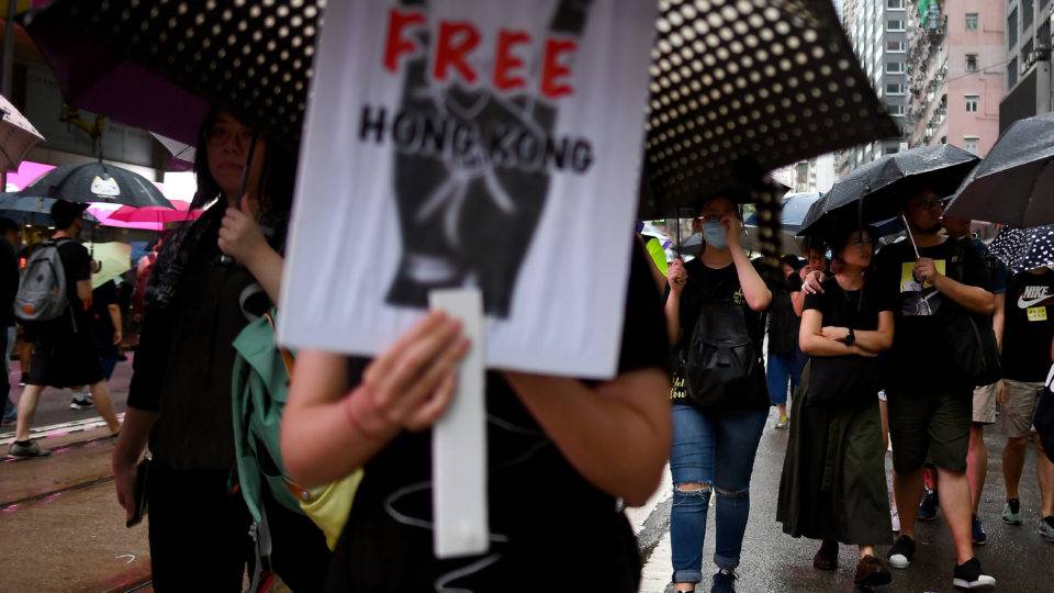 Manifestantes em um protesto em Hong Kong em 18 de agosto