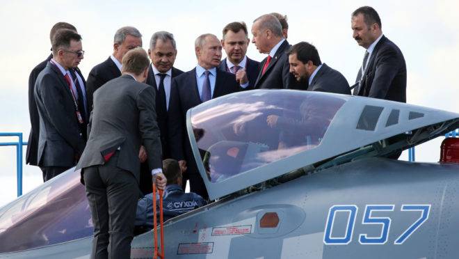 Vladimir Putin and Recep Tayyip Erdogan inspect a Sukhoi Su-57 fighter jet in Moscow, on Aug. 27, 2019. MUST CREDIT: Bloomberg photo by Andrey Rudakov.