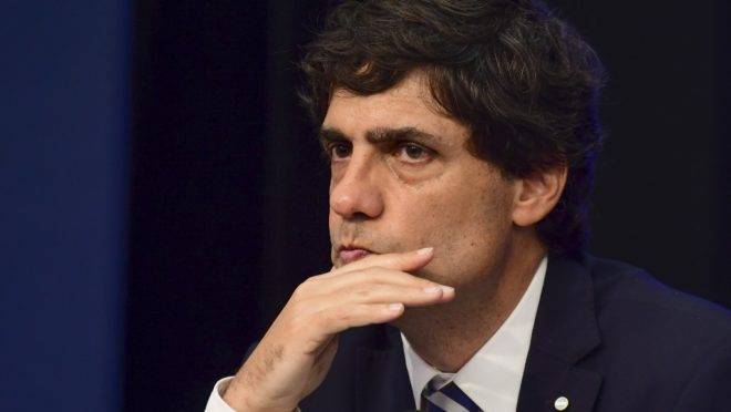 Argentina’s Finance Minister Hernan Lacunza attends a press conference to announce new economic measures in Buenos Aires, on August 28, 2019. – The peso — which lately lost 20 percent of its value as markets reacted to a crushing primary election defeat for Argentina’s President Mauricio Macri — showed no signs of a bounce. (Photo by Ronaldo SCHEMIDT and RONALDO SCHEMIDT / AFP)