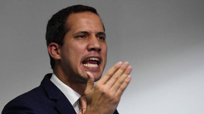 Venezuelan opposition leader and self-proclaimed acting president Juan Guaido speaks during a press conference in Caracas, on October 17, 2019. – Venezuela won a seat on the UN Human Rights Council Thursday, sparking outcry from the United States, advocacy groups and Latin American countries who say its rights record is appalling. (Photo by Federico PARRA / AFP)