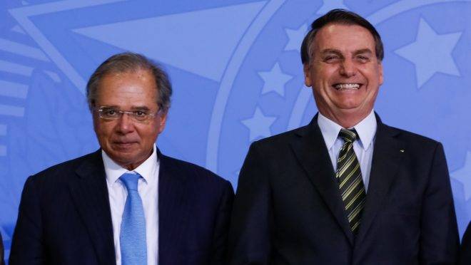 O ministro Guedes e o presidente Bolsonaro no lançamento do programa Verde Amarelo.