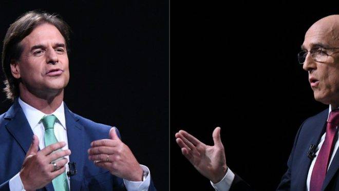 Os candidatos à presidência do Uruguai, Luis Lacalle Pou do Partido Nacional (esq.), e Daniel Martínez da Frente Ampla