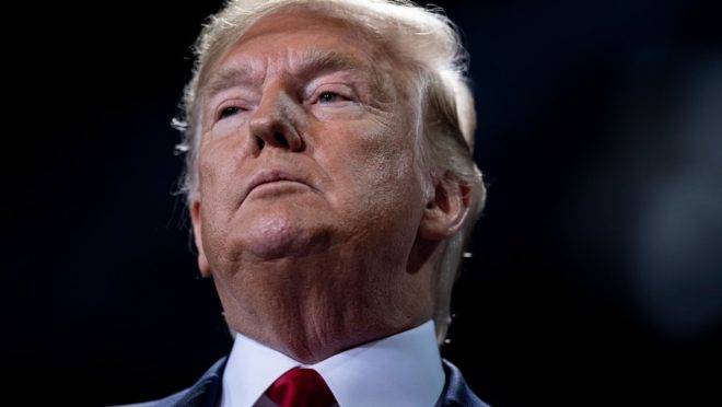 O presidente dos Estados Unidos, Donald Trump, em comício em Battle Creek, Michigan, no dia da votação do impeachment contra ele pela Câmara, 18 de dezembro de 2019