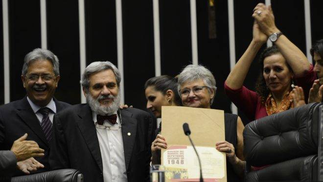 Em sessão solene realizada em 2013, o Congresso devolveu simbolicamente os mandatos de 14 deputados comunistas cassados em 1948. Entre os deputados homenageados há personagens como o escritor Jorge Amado, além de figuras históricas como João Amazonas e Carlos Marighella.