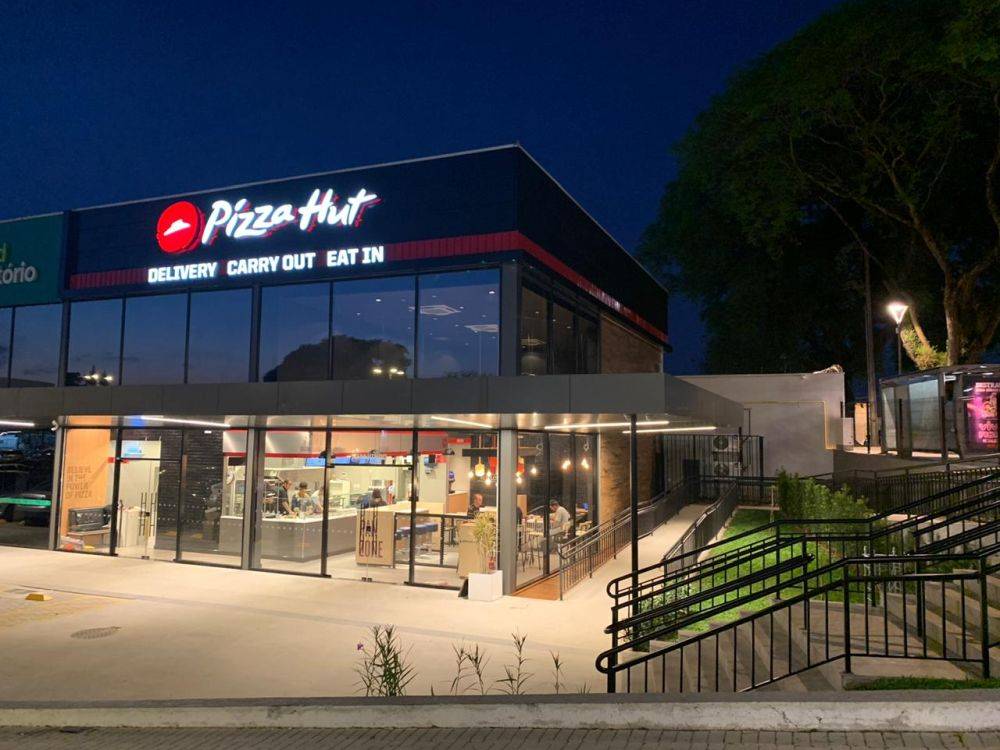 Entre as marcas da IMC, a Pizza Hut já opera 200 pontos de venda em todo o país em diferentes formatos. Foto: divulgação. Entre as marcas da IMC, a Pizza Hut já opera 200 pontos de venda em todo o país em diferentes formatos. Foto: divulgação.