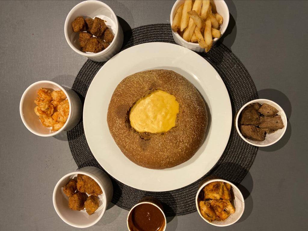 O fondue do Outback é servido no pão australiano. Foto: Gisele Rech O fondue do Outback é servido no pão australiano. Foto: Gisele Rech