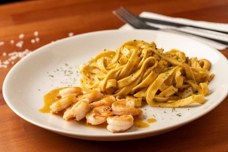 Fettucine com camarões do Curry Pasta. Foto: Divulgação Fettucine com camarões do Curry Pasta. Foto: Divulgação