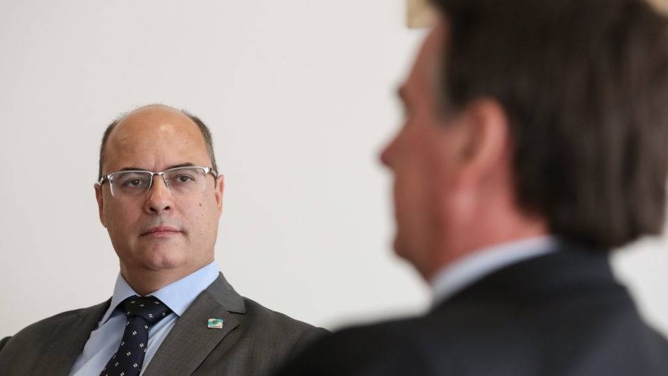 O governador afastado Wilson Witzel e Jair Bolsonaro: presidente conseguiu colocar governadores da oposição na defensiva, ficou mais perto de fechar aliança defintiva com o PSC e ainda pode esfriar o caso das rachadinhas.
